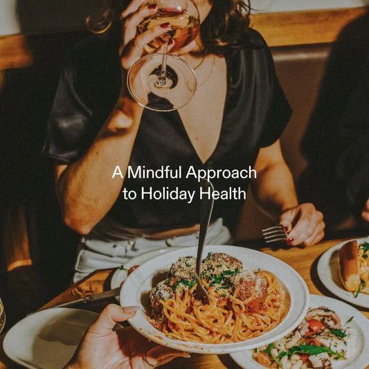 Woman enjoying holiday meal – mindful eating approach to maintain health during the holidays