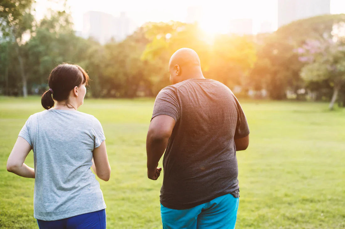 Couple walking outdoors to improve metabolic health and support GLP-1 function