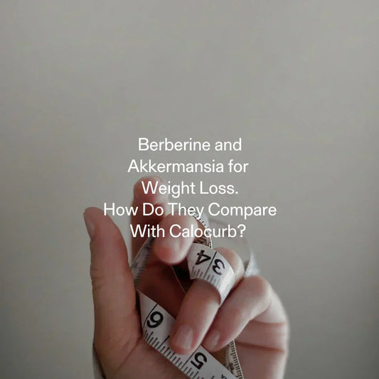Hand holding measuring tape – comparing Calocurb with Berberine and Akkermansia for weight loss