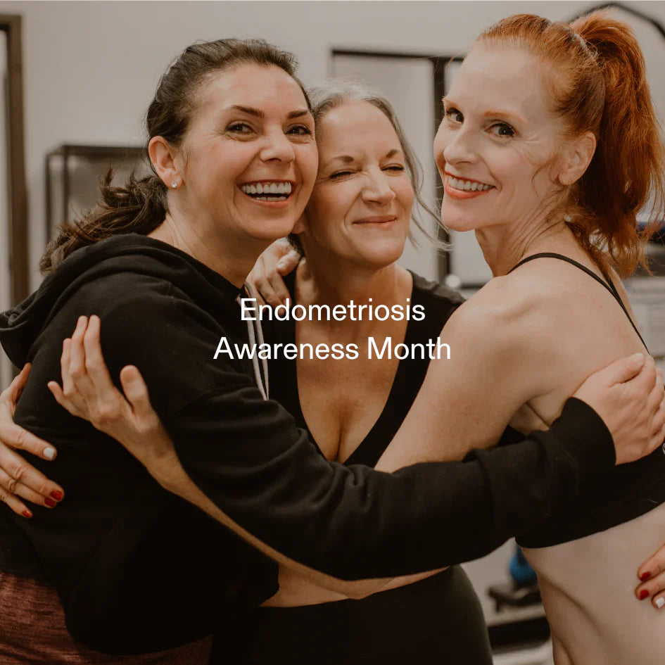 Group of smiling women embracing – supporting endometriosis awareness and hormone-related weight health