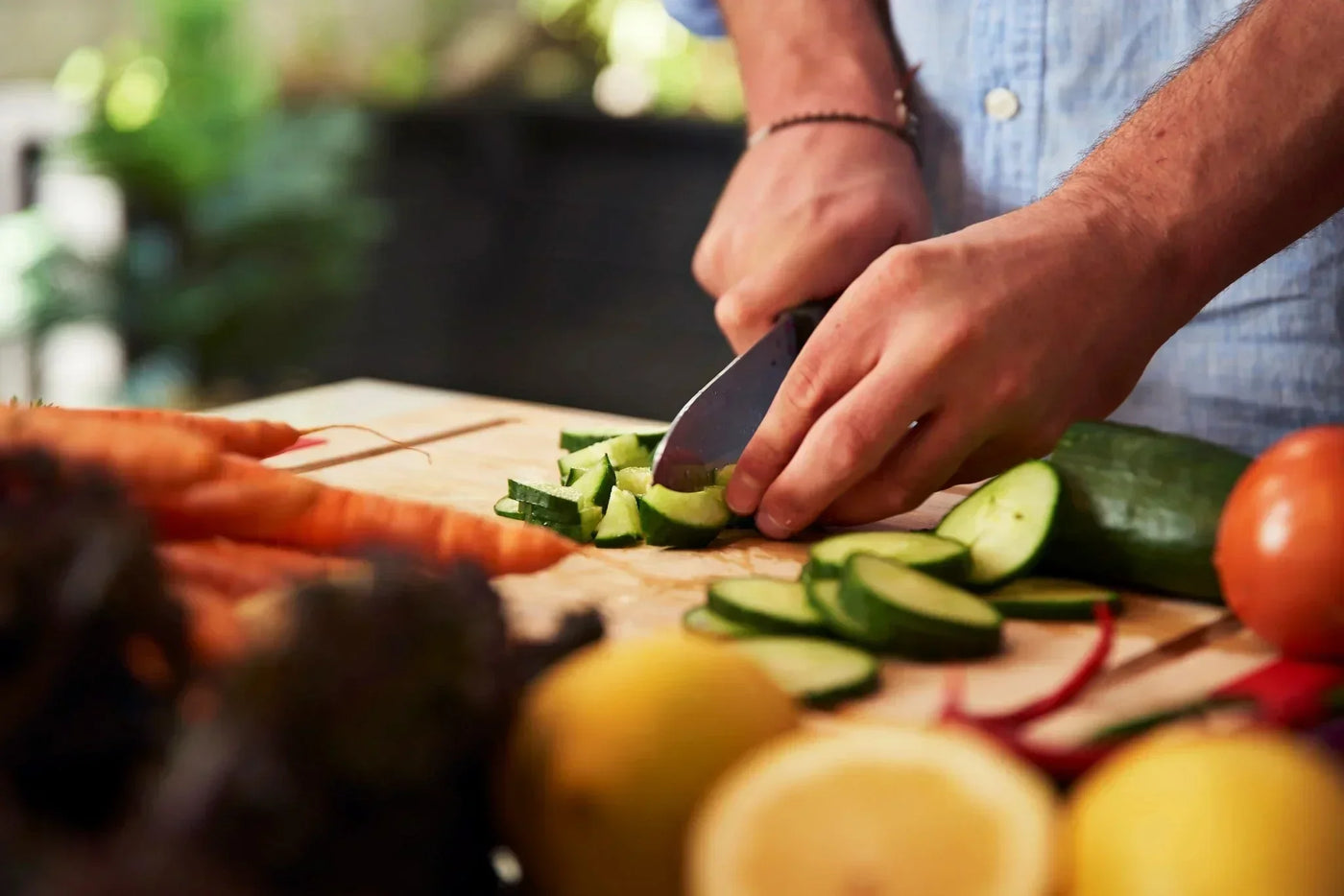 Chopping fresh vegetables for plant-based GLP-1 meal prep and appetite suppressant support