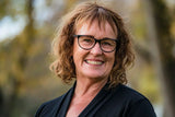 Smiling woman after natural GLP-1 agonist support for appetite control and weight balance