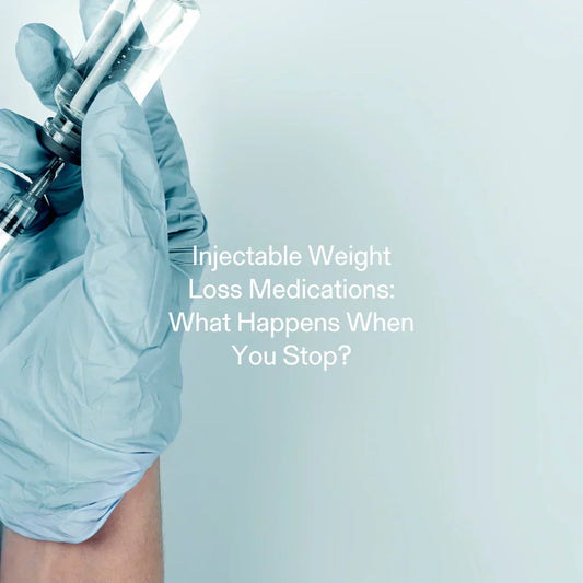 Gloved hand holding syringe – stopping injectable weight loss medications and managing rebound effects